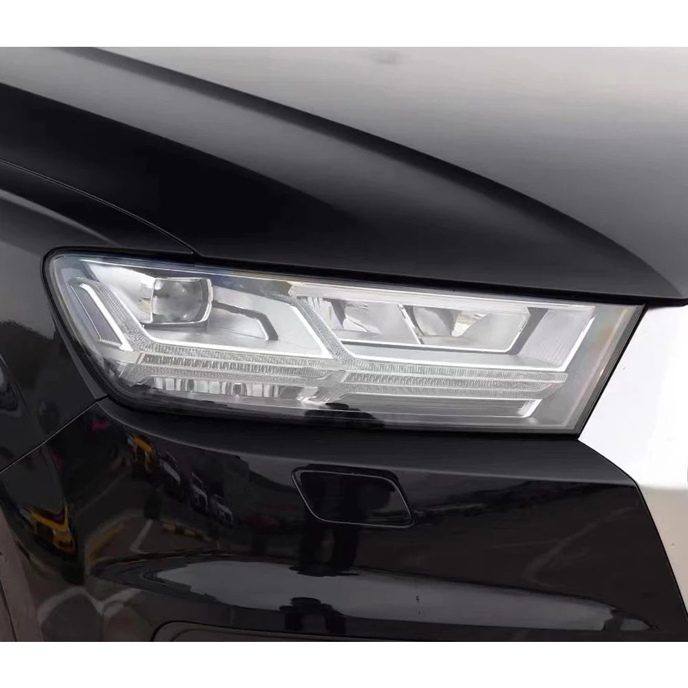 Audi Q7 headlight lens